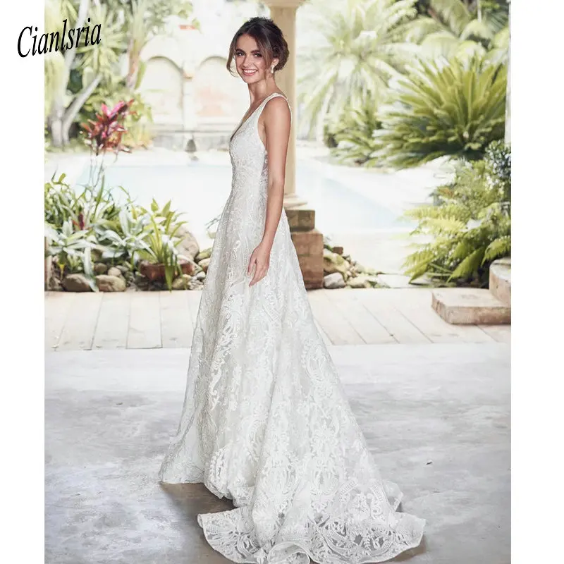 

2019 free shipping good quality bridal gown lace appliques deep V neckline cut open back court train wedding dresses