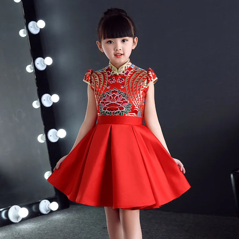 Little girl and Angpao. Children personality in red cheongsam