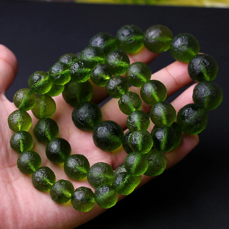 

Natural Moldavite Natural Czech meteorite fall rough stone crystal Energy stone bracelet random delivery