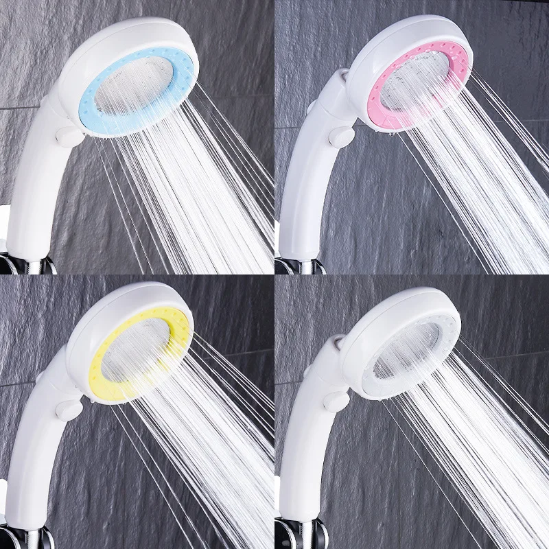 Pressurized water saving hand held shower head with push button switch