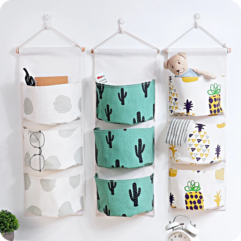 

Creative three pocket storage bag bedroom wall storage groceries cosmetics key organizer polyester cotton material waterproof