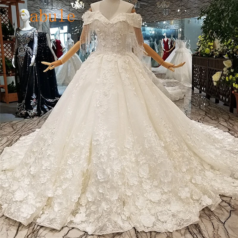 

Princess lace flowers wedding dress luxurious appliques beads Bride wedding gowns cap sleeve ball gown sweetheart long train