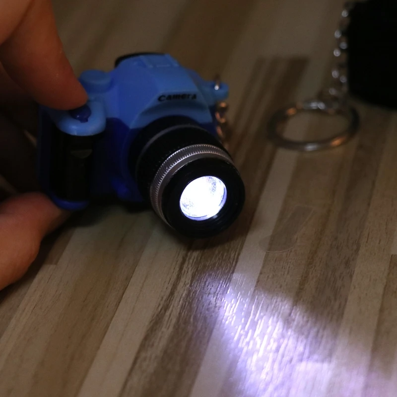 

Mini Digital Reflex DSLR Camera LED Flash Light Torch Shutter Sound Keychain