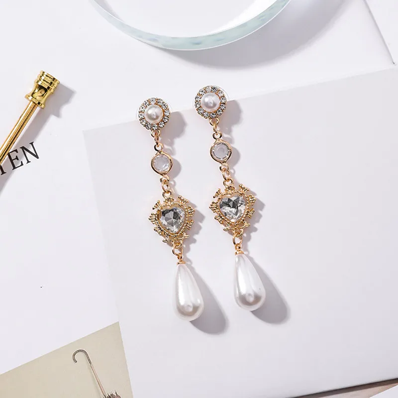 

Dominated Fashion pearl heart-shaped earrings contracted style restoring ancient ways sweet long Women Drop earrings Jewelry