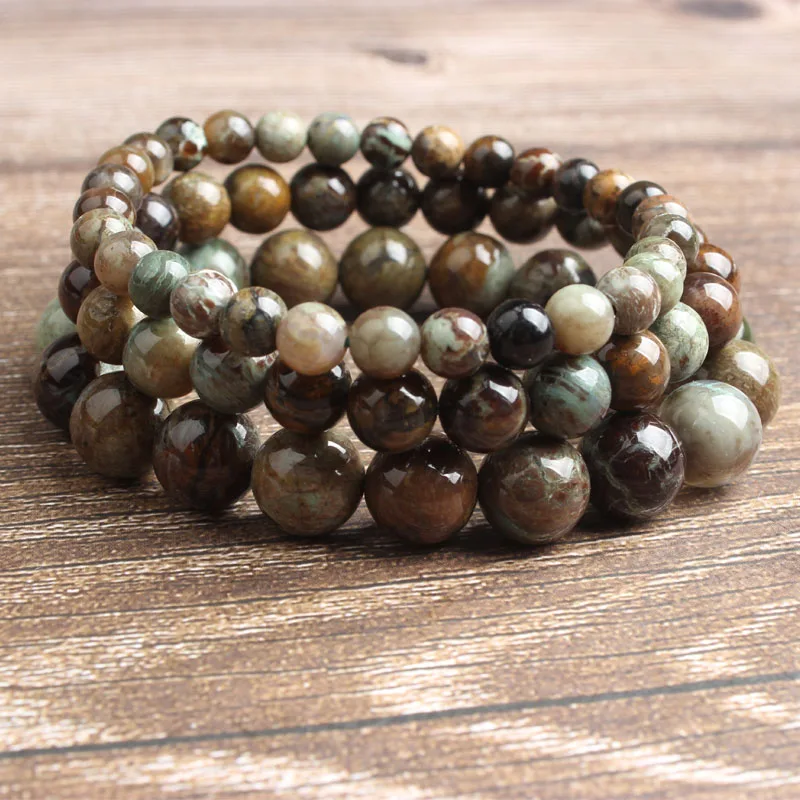 

Ling Xiang 6/8/10mm fashion Jewelry Natural Snakeskin stone bracelet series Attractive male and female ornaments and amulets
