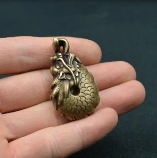 

Chinese antique pure brass zodiac dragon pendant