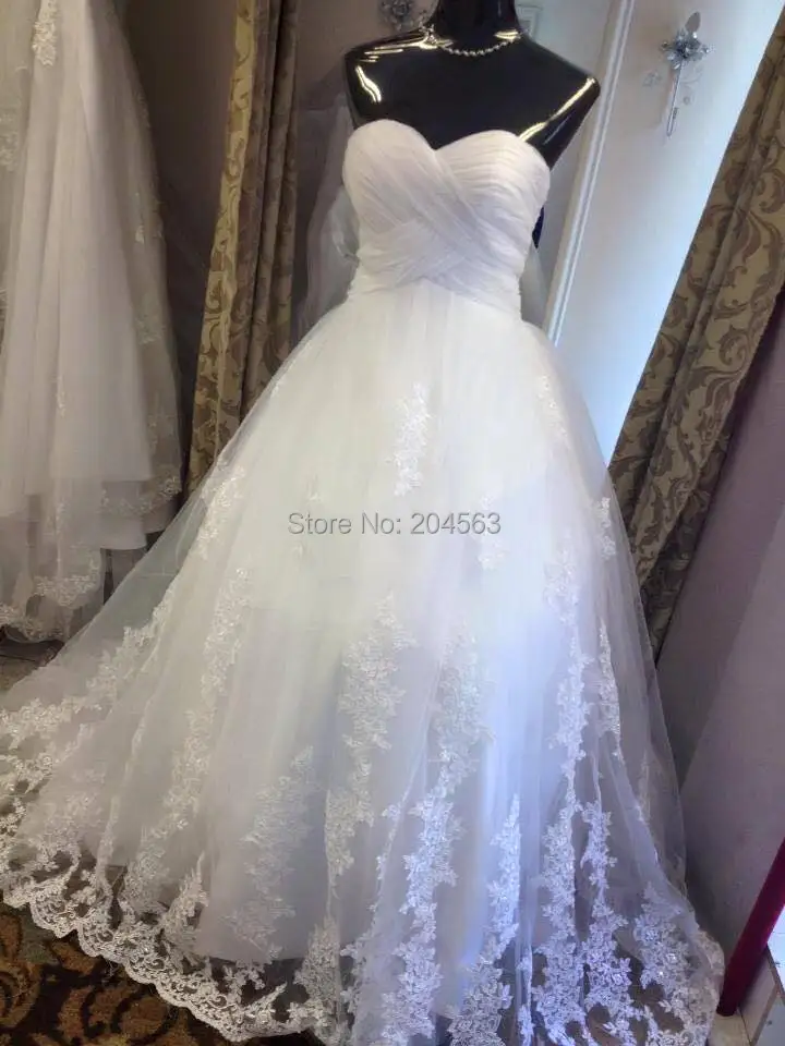 

Hot Sale Latest White/Ivory A Line Wedding Dresses with Appliques and Beads Chapel Train Back Open