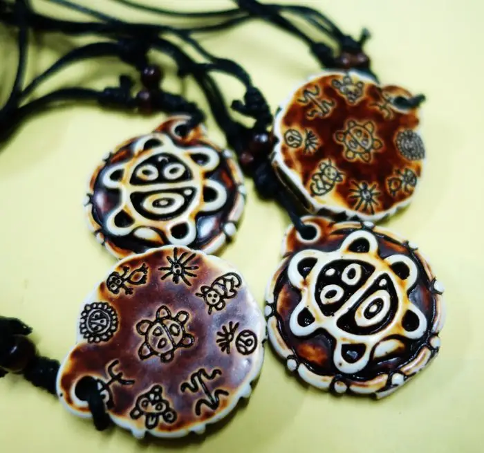 

FREE SHIPPING 10 PCS Rare Taino Indians Culture SUN GOD Embossed Two Sided Necklace