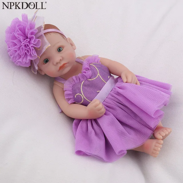 

NPKDOLL Mini Reborn Baby Doll 10 inch Girls Kids Playmate Full Vinyl Soft Christmas Gifts Purple Dress Beautiful Bebe Reborn