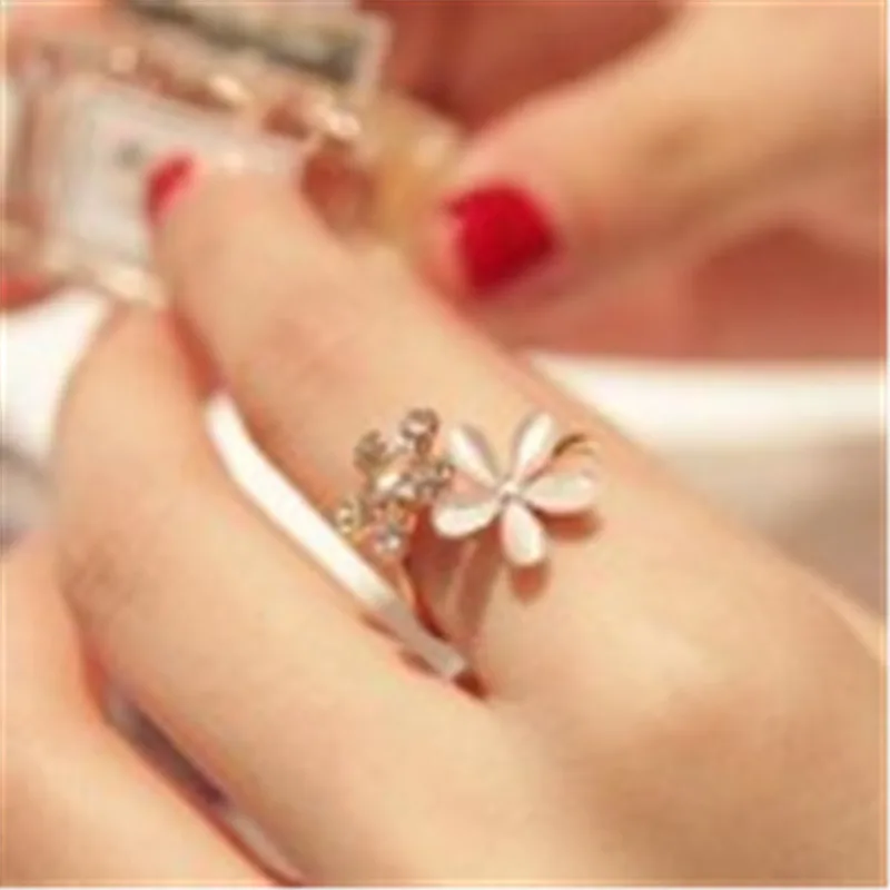 

Korean Opal adjustable female flowers Crystal ring of small daisy opening ring for women man jewelry wholesale free shipping