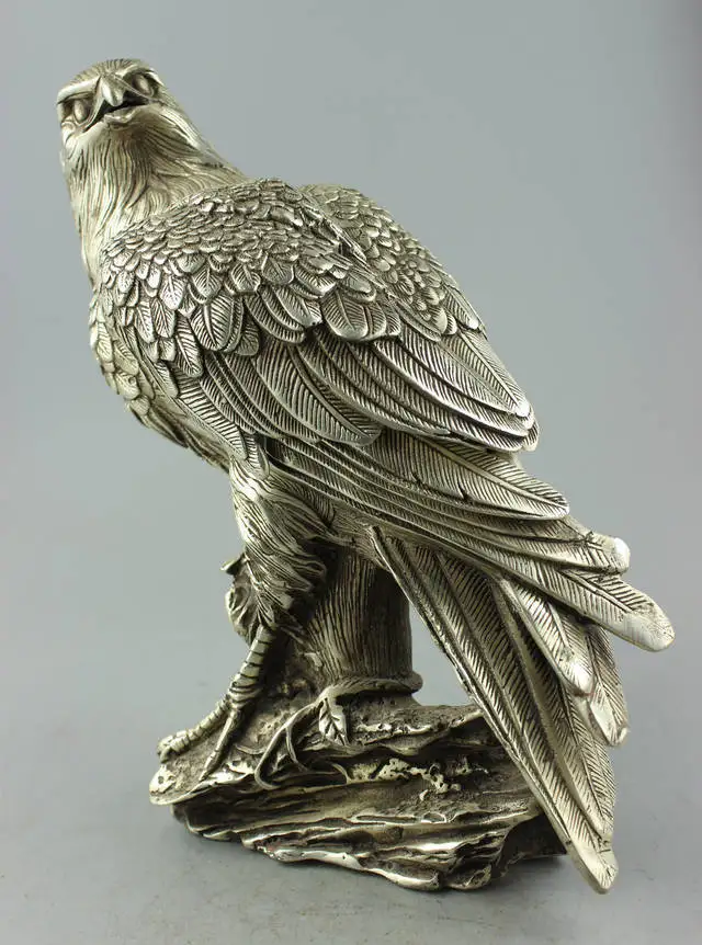 

Collectible Decorated Old Handwork Tibet Silver Carve Eagle On Tree Box & Statue