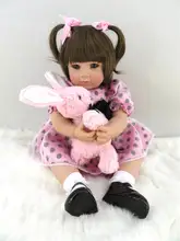 Muñeca reborn de 50 cm con vestido rosa a lunares