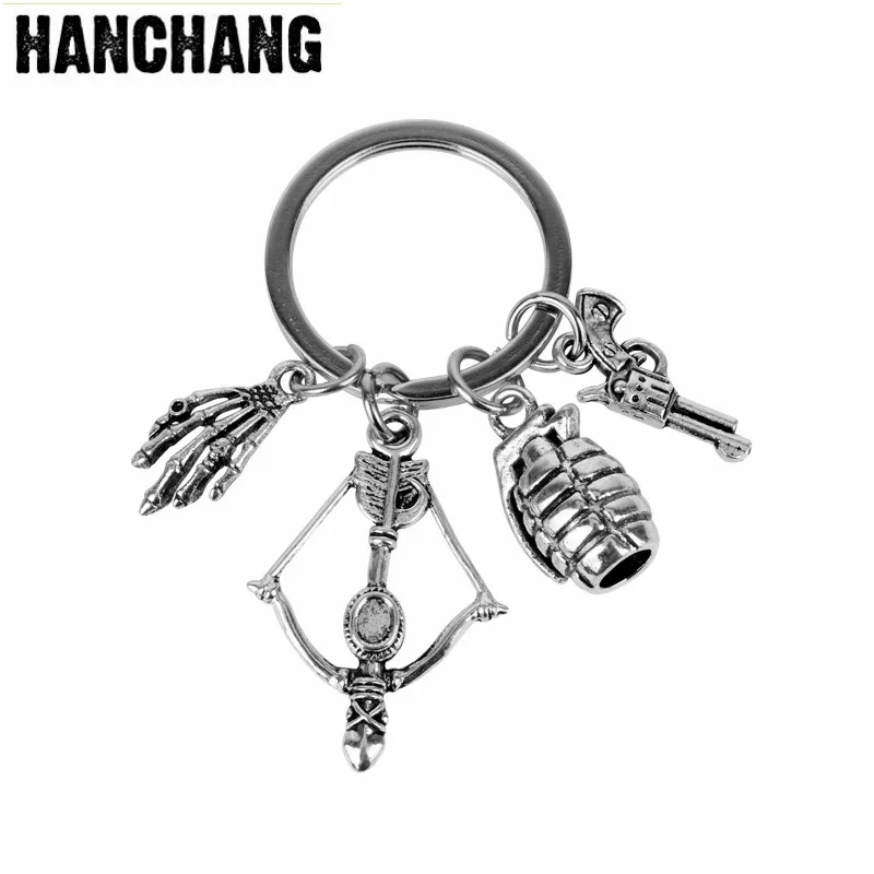 

Movie Walking Dead Keychain Movie Jewelry Horror Skull Hand Crossbow Gun Pendant Metal Keyrings Key Holder Women Men Accessories