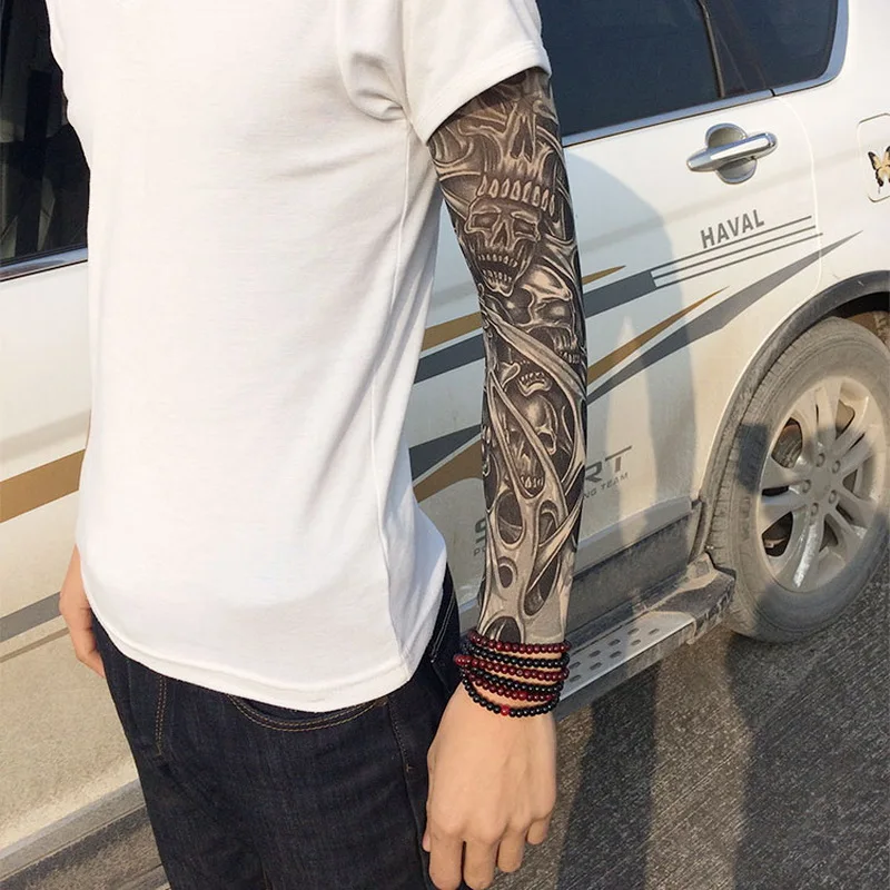 1pc new 40cm tattoo sleeve color styles elastic Fake 100%nylon Arm stocking Buddha Wolf Dragon Skull design halloweend cool men 1pc new 40cm tattoo sleeve color styles elastic Fake 100%nylon Arm stocking Buddha Wolf Dragon Skull design halloweend cool men