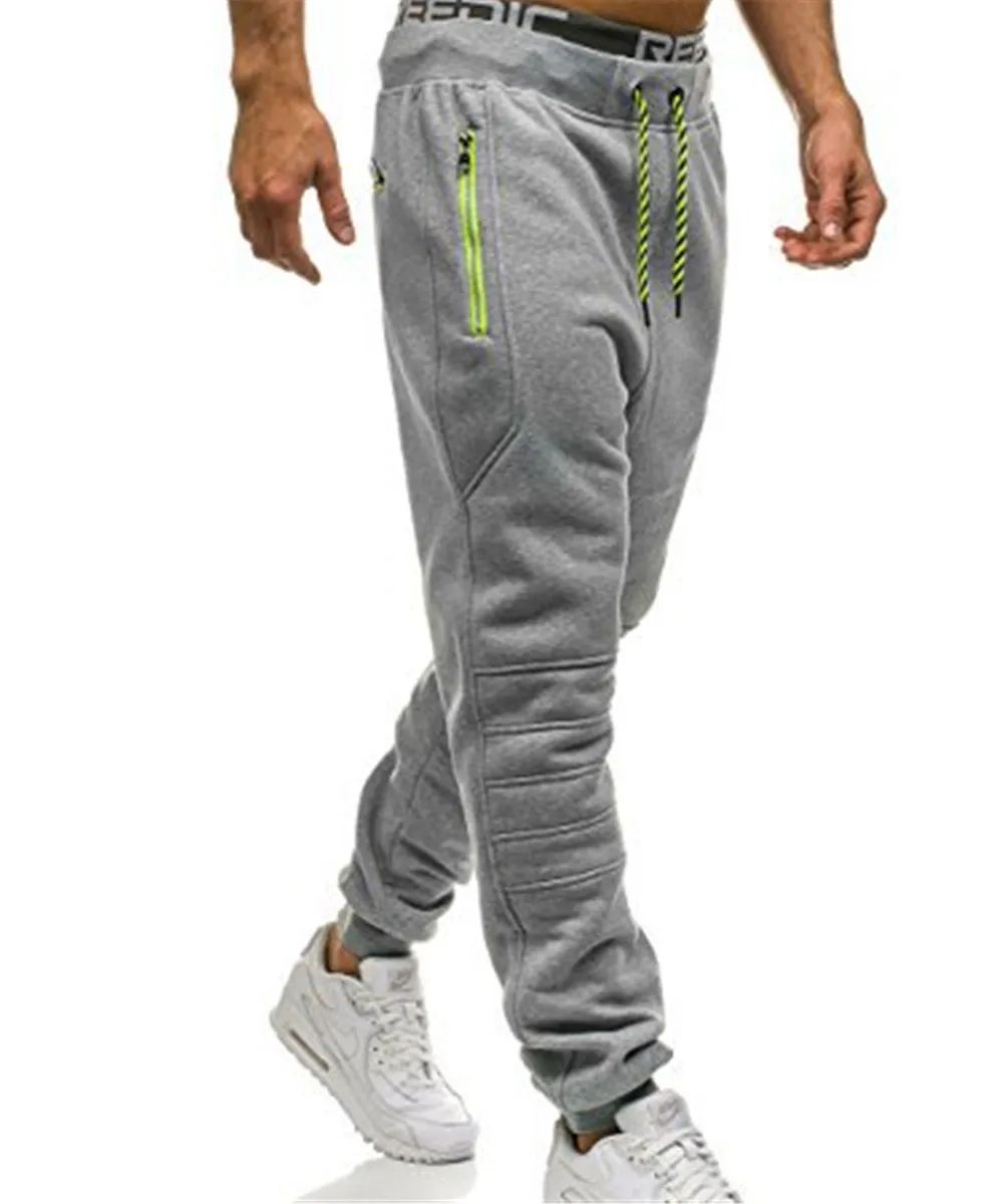 Acheter Pantalons de survêtement hommes fermeture éclair poches couleur unie pantalon hombre pantalon décontracté hommes vêtements 2018 Joggers pantalon homme mode vêtements de rue