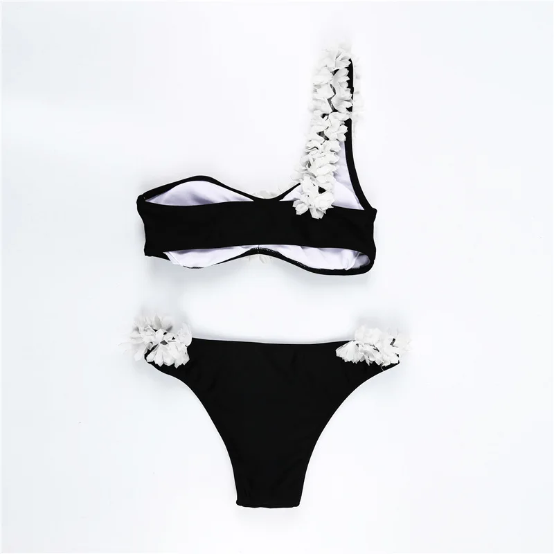 Real photo of black feather bikini back