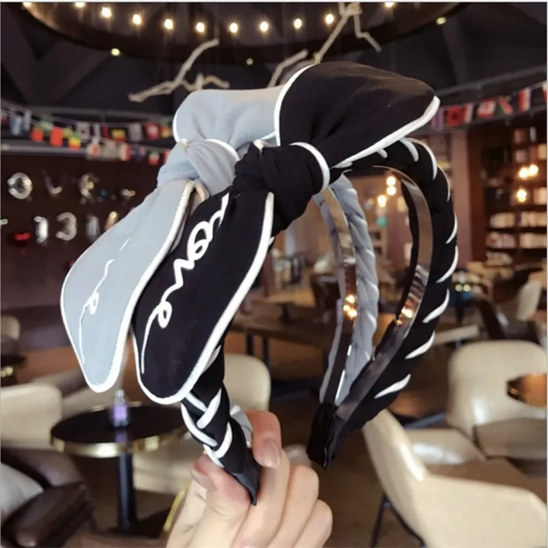 

South Korea's new high-end fashion Love letter print bow braided hair hairband headband hair accessories Korean cloth ladies