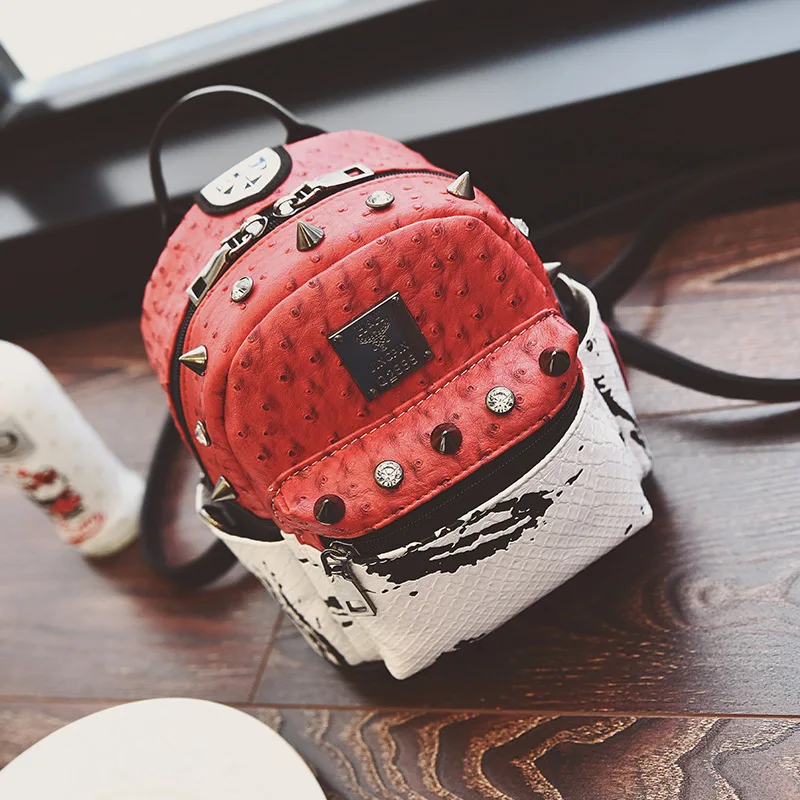 2017 New Fashion Lady Bag Fashion Rivet Leather backpack rivets purse little girl shoulder bag female