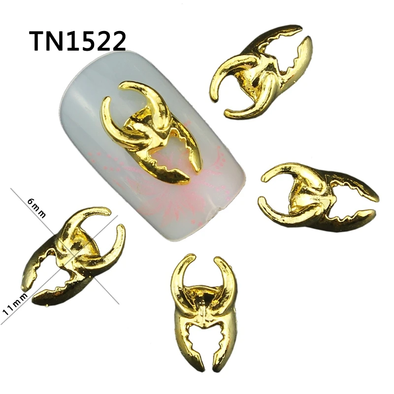 

Top Nail 10Pcs/Lot Horns Mask Design Gold Metal Manicure Beauty Nail Art Tips Charms 3D Alloy Decorations For Nails TN1522