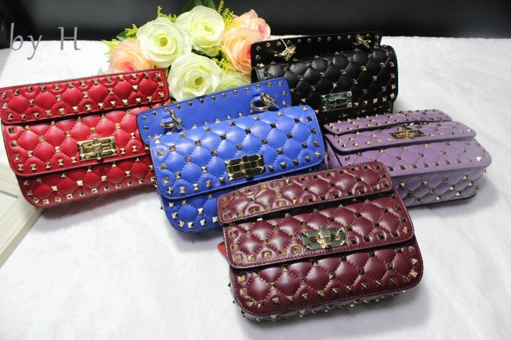 

by H genuine leather designers spiked bag womens luxury clutch rivet messenger bag party bag metal chain corss body bag totes