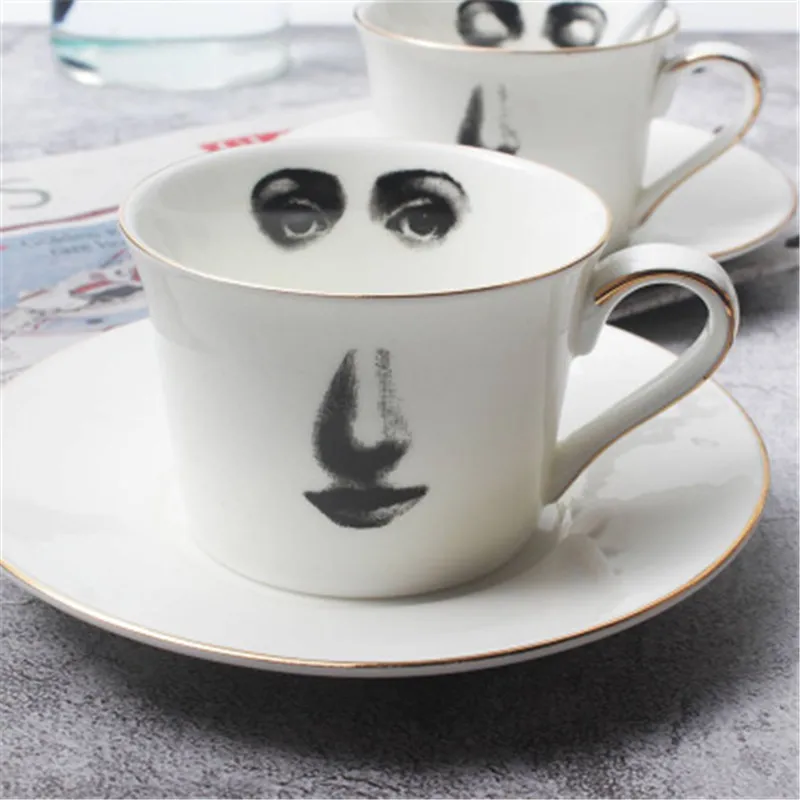 

Italy Fornasetti Human Face Ceramics Cups And Saucers Combination Decoration Creative Living Room Coffee Cup Ornaments X2104