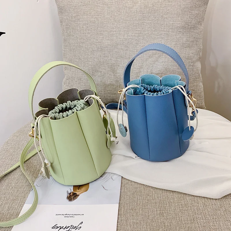 

Newest MINI Drawstring bucket bag women leather MINI shoulder bag, lady leather cross bag,Petal shape handbag free shiping