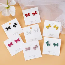 Coreano parafuso prisioneiro brincos pouco kawaii bonito feminino atacado doce sólido arco nó moda jóias meninas presente