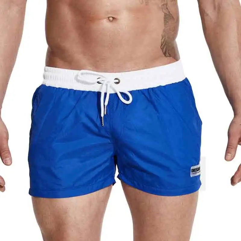 Мужские купальные шорты плавки для мужчин пляжные бермуды для серфинга Плавки нейлоновые быстросохнущие спортивные штаны для бега сетчатая юбка - Цвет: S601 Blue