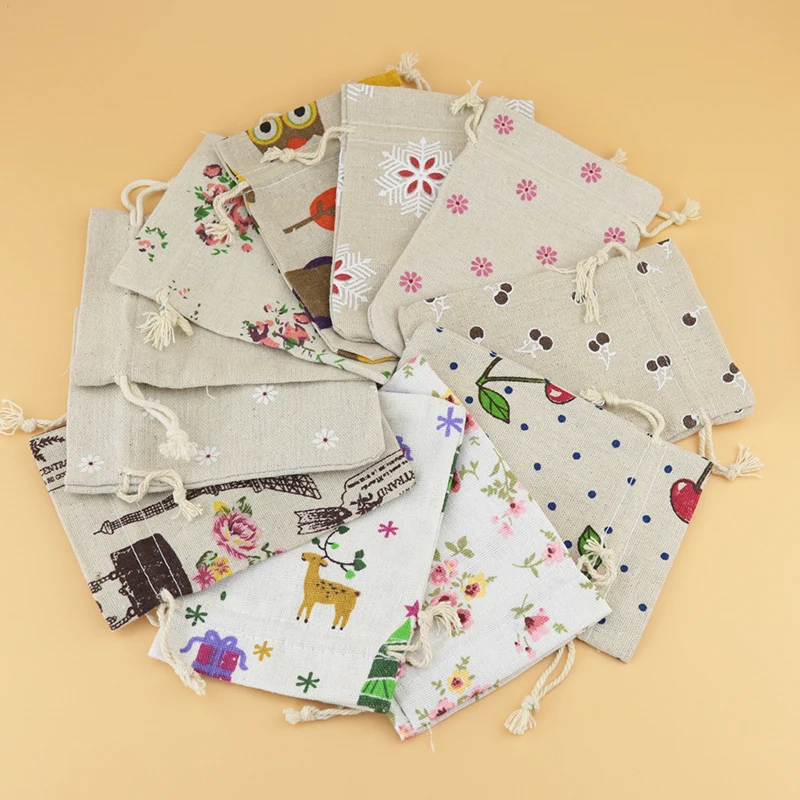 

Wholesale 50pcs/lot 10x14cm Cotton Bags Favor Random Mixed Drawstring Pouch Gift Bag Cute Charms Watch Jewelry Packaging Bags