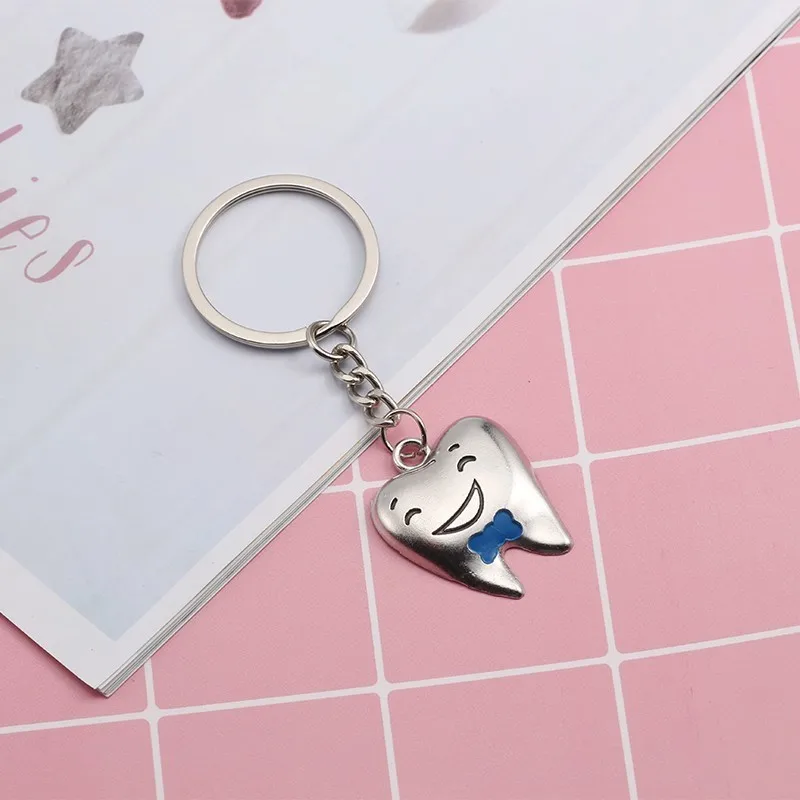 2-Pcs-Cartoon-Couple-Keychain-Cute-Bowknot-Teeth-Tooth-Key-Chain-Dentist-Decoration-Jewelry-For-Doctor (2)