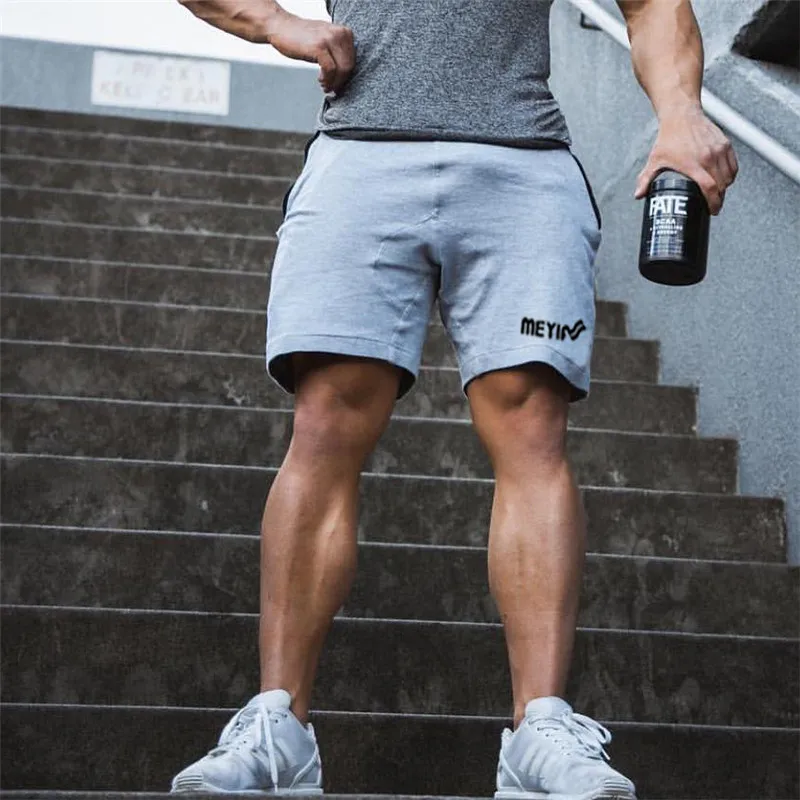 2019 мужские хлопковые шорты до середины икры тренажерные залы Повседневная тренировка для бегунов брендовая спортивная форма короткие