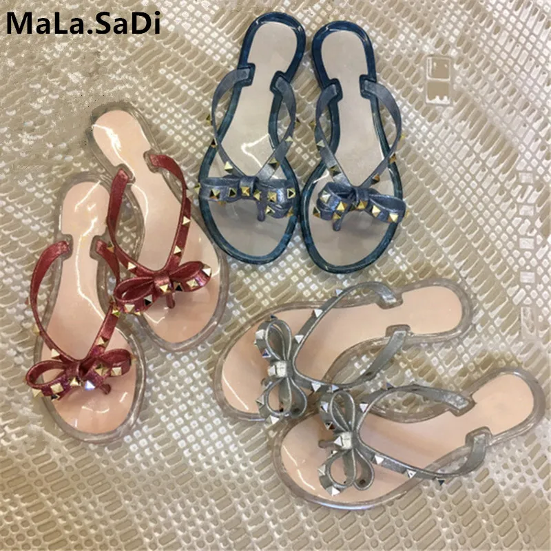 New Fashion Summer Woman Sandals Rivet Studs Flip Flops Slip On Bow knot Flat Slippers Studded Cool Beach Slides Jelly Shoes New Fashion Summer Woman Sandals Rivet Studs Flip Flops Slip On Bow knot Flat Slippers Studded Cool Beach Slides Jelly Shoes