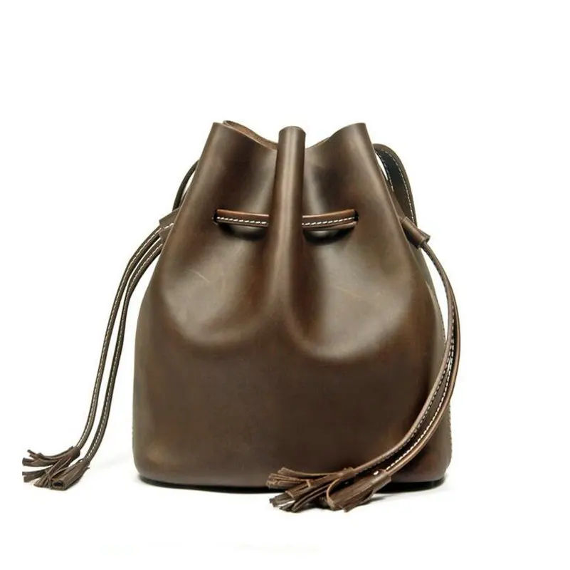 

The new bucket bag in Women's bags are covered with a single shoulder bag 100% Genuine leather female bag