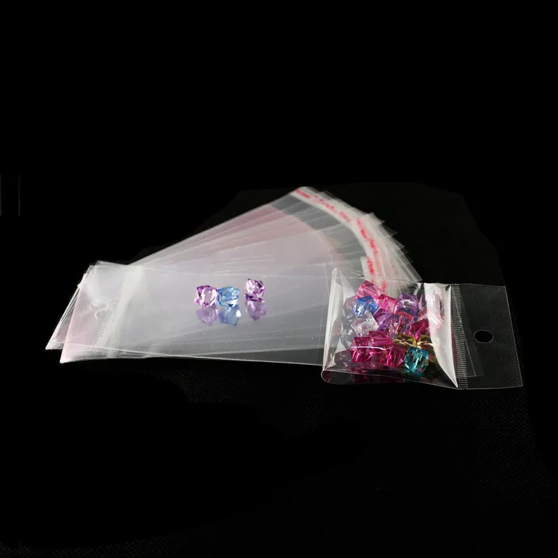 100pcs 7x14cm Clear Self Adhesive Seal Plastic Bags Transparent Resealable OPP Packing Poly Bags Pick Beads Hanging Holes