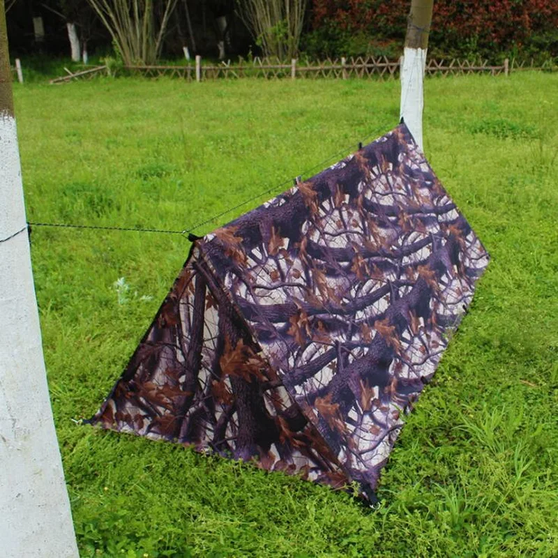 

Camping multi-purpose individual tactical tent. Outdoor canopy, waterproof and moistureproof picnic mat, poleless awning
