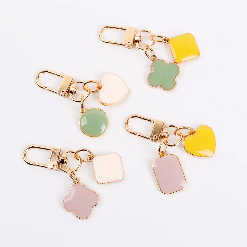 

simple heart-shaped geometric shell key creative car keys pom pom keychain cute keychain llaveros para mujer
