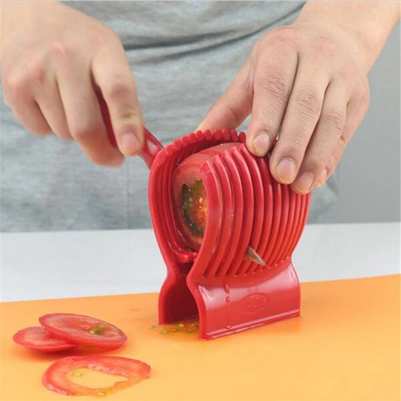 

Free Shipping 1PCS Red Tomato Holder Slicer Guide Potato Onion Cutter Fruit Vegetable Orange Shredders Slicers Kitchen Tool