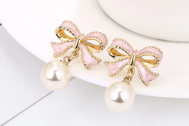 韓国人気【MONDAY EDITION】Tiny Pearl Bow Earrings☆追跡付 TIE THE RIBBON - MONDAY EDITION