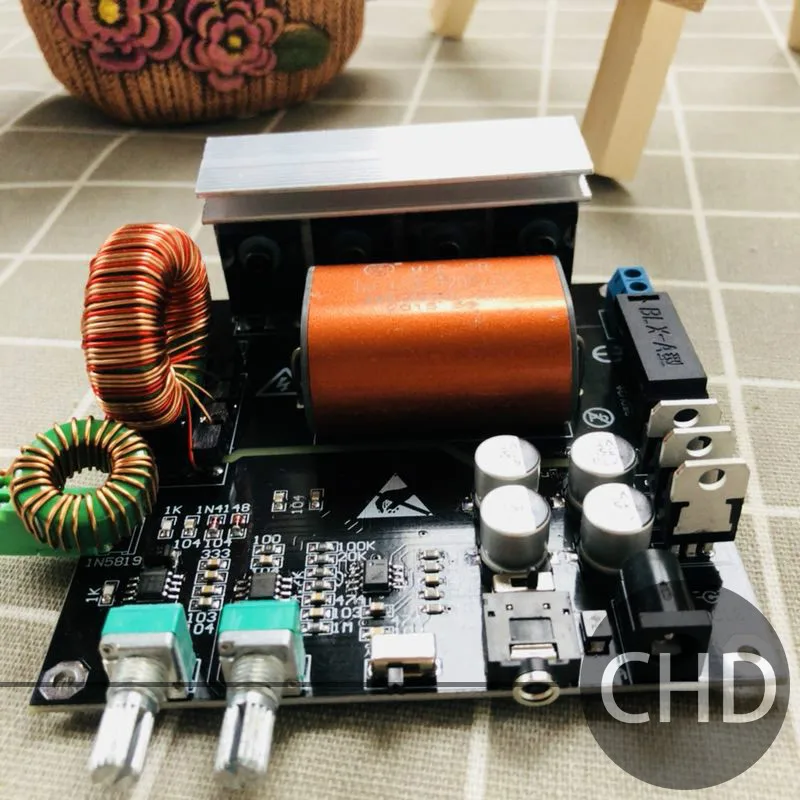 

SSTC integrated drive plate integrated solid state Tesla coil