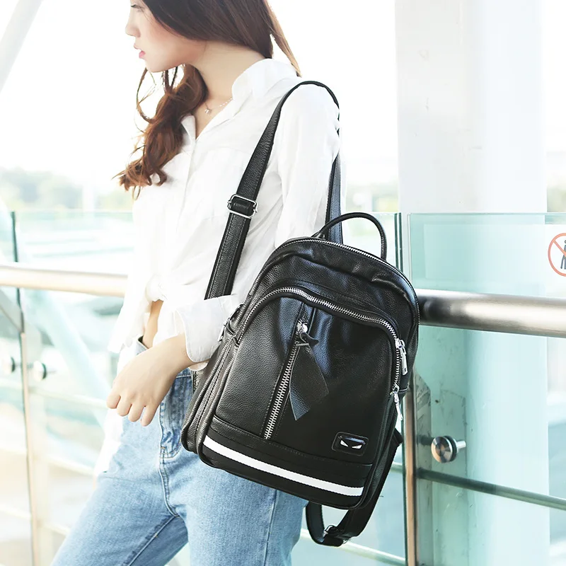 

Korean version of the belt decoration fashion leather leather backpack women luxury brand monster backpack schoolbag