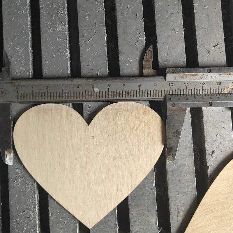 

Free shipping! 100mm heart wood cut beads