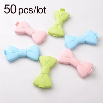 

50 Pcs/lot Useful Kitchen tool bag clips plastic Sealing food clamp Snacks clip folding silicone food closure bow shape