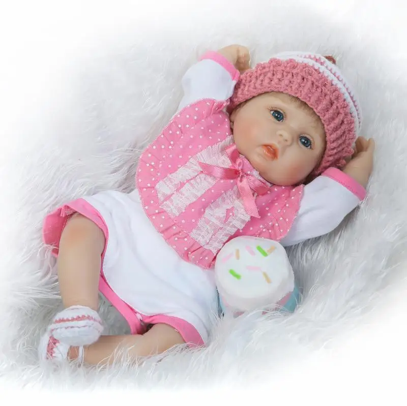 

NPK Bebe Reborn Doll sumilation newborn baby girl with lovely Knitted hat Pink Suit silicone baby reborn doll Kids playmate