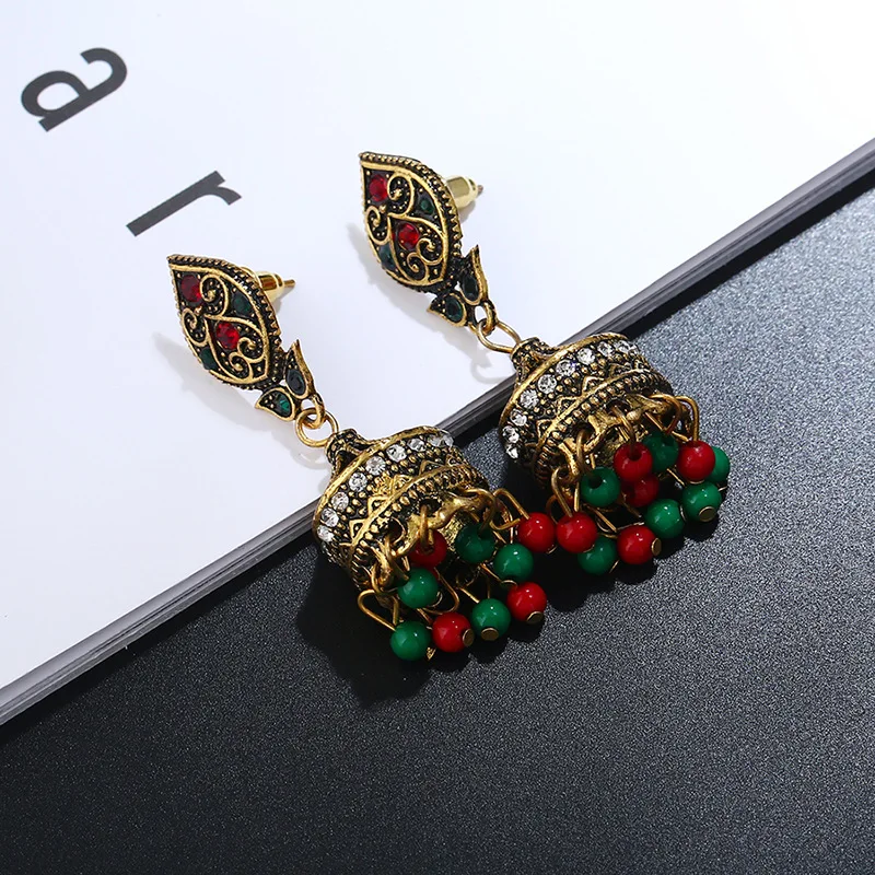 New Earrings Retro National Wind Hollow Carved Bells Alloy Earrings