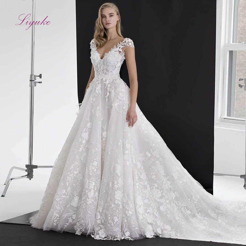 

Liyuke 2019 A-line Wedding Dress Lace Appliques V-neck Cap Sleeves Backless Tulle Customized Free Shipping