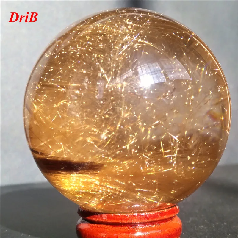 

Natural rutilated quartz crystal ball