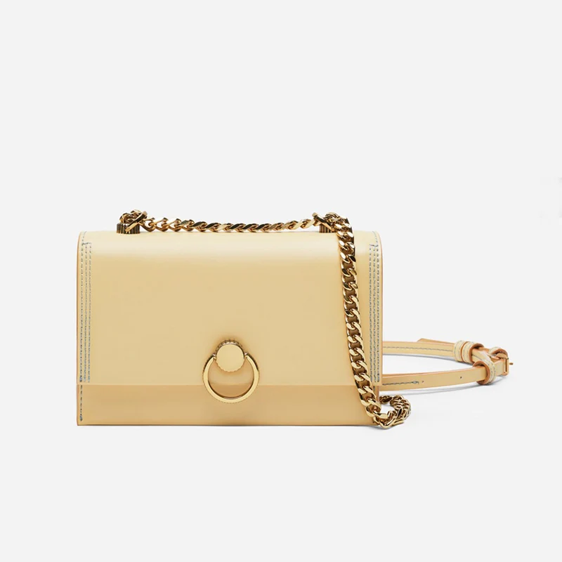 

Metal round buckle female 2019 new Singapore small CK simple retro cow nose single shoulder chain small pack
