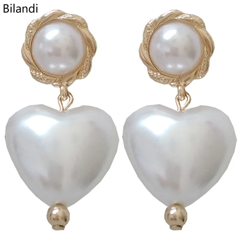 

Fancy Design Newest Jewelry Acrylic Pearl Clear Heart Earring For Woman