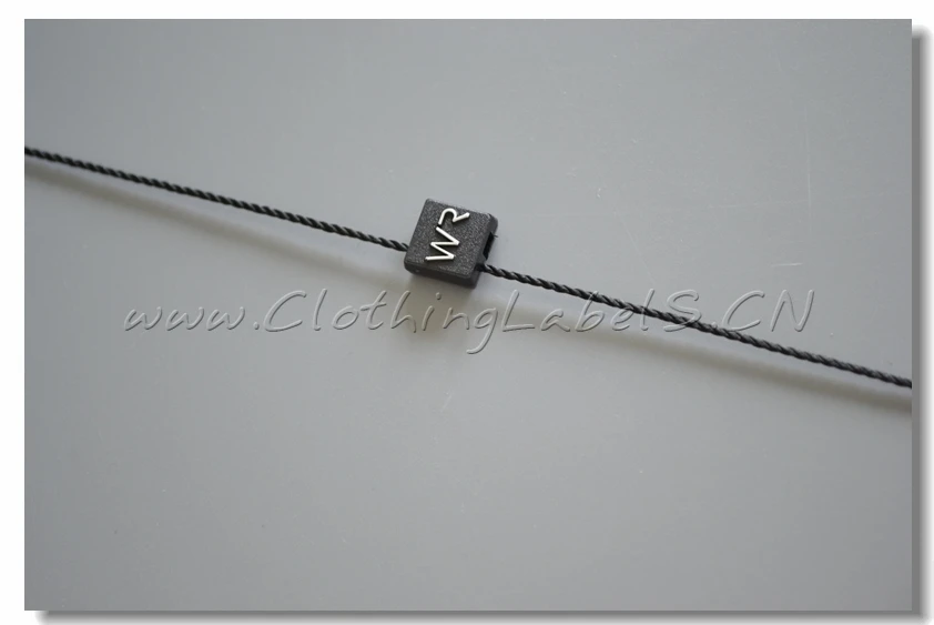 custom hang tag string, plastic seal tag string as customized, embossed