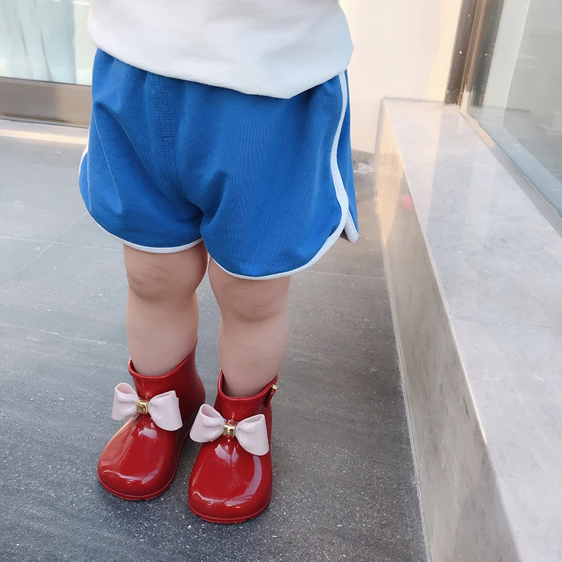 Mini Melissa/непромокаемые резиновые сапоги для девочек с бантиком; Новинка года; прозрачные сандалии Melissa для девочек; Нескользящие Детские дождевые ботинки; Водонепроницаемая детская водонепроницаемая обувь